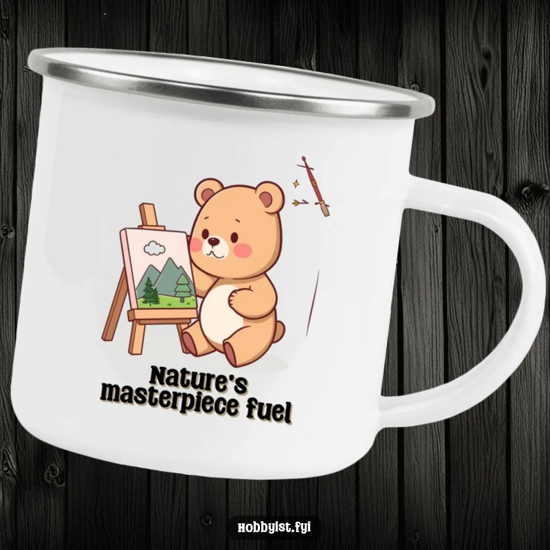 Funny Camping Mug featuring a cute bear artist happily painting a miniature landscape on a small canvas, inspiring creativity even in the wild.