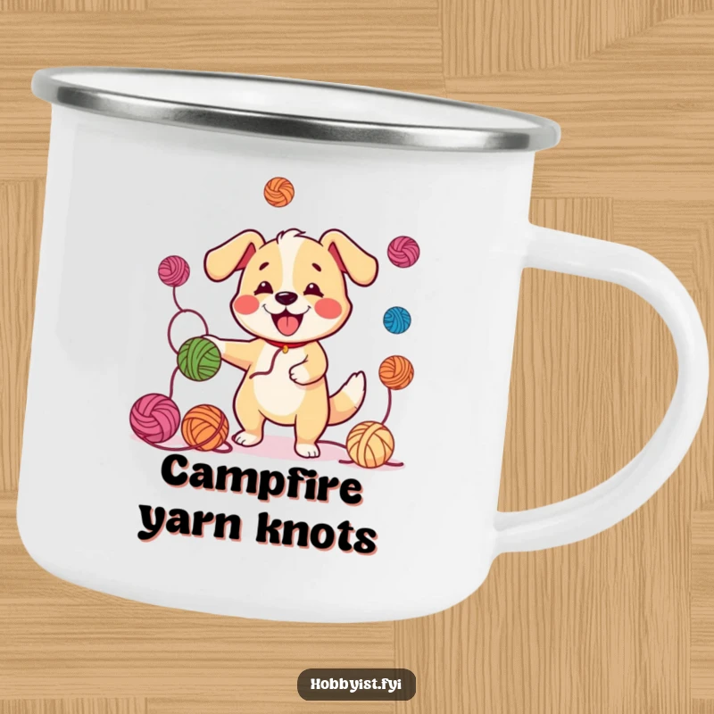 Funny Juggling Dog Yarn Camping Mug: A cheerful dog juggling yarn balls with a wagging tail on an enamel mug for outdoor enjoyment.