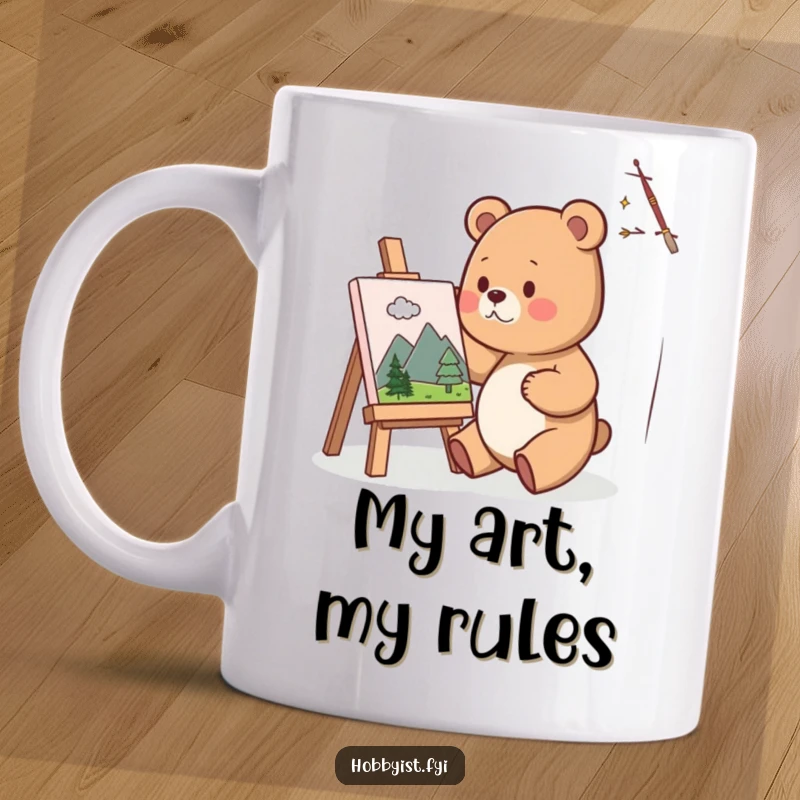 Funny Mug featuring a cute bear artist happily painting a miniature landscape on a small canvas, showcasing artistic passion and serene focus.