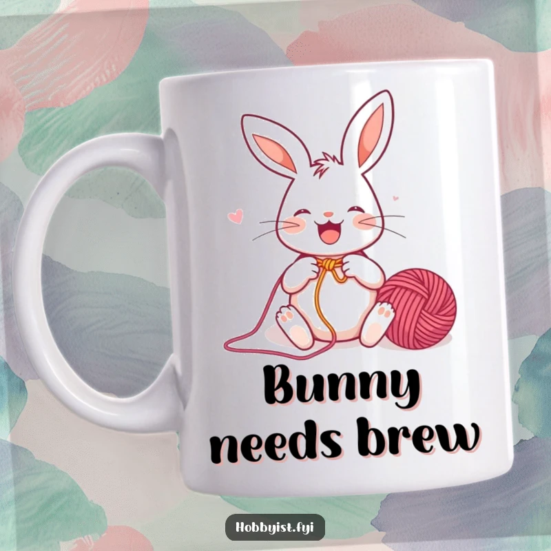 Funny Mug featuring a joyful rabbit enthusiastically knitting a colorful yarn ball, embodying creative passion and cheerful crafting.