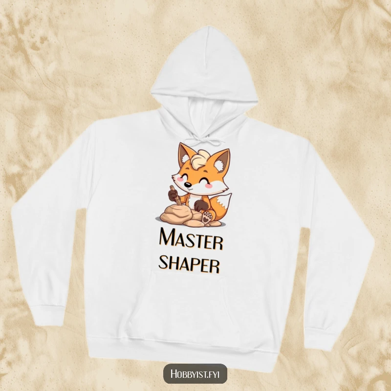 Funny mischievous fox sculpting clay with concentration, on a cozy hoodie, a humorous and artistic gift.