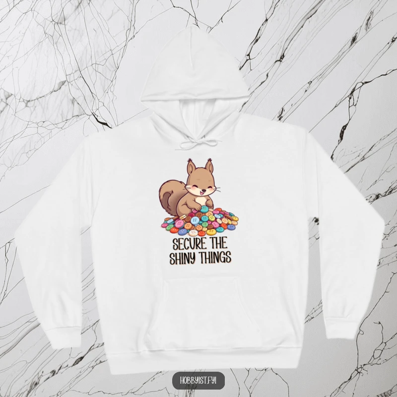 Funny hoodie showcasing a smiling squirrel diligently sorting an overflowing pile of shiny buttons, perfect for cozy, humorous wear.