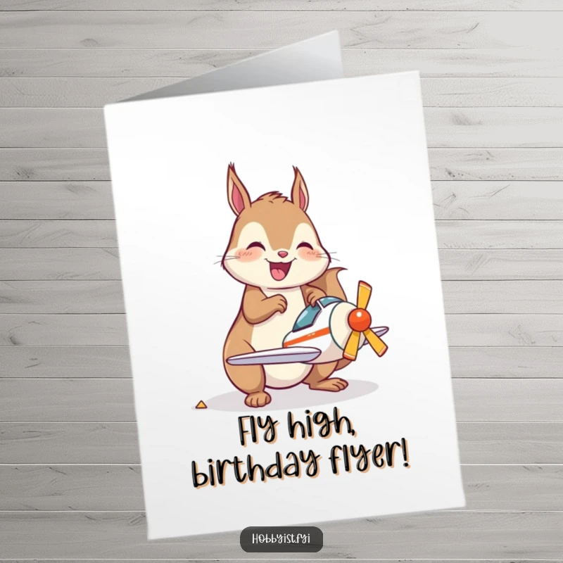 Funny Free Printable Birthday Card: Joyful kawaii squirrel character intently assembling a miniature model airplane with a smile.