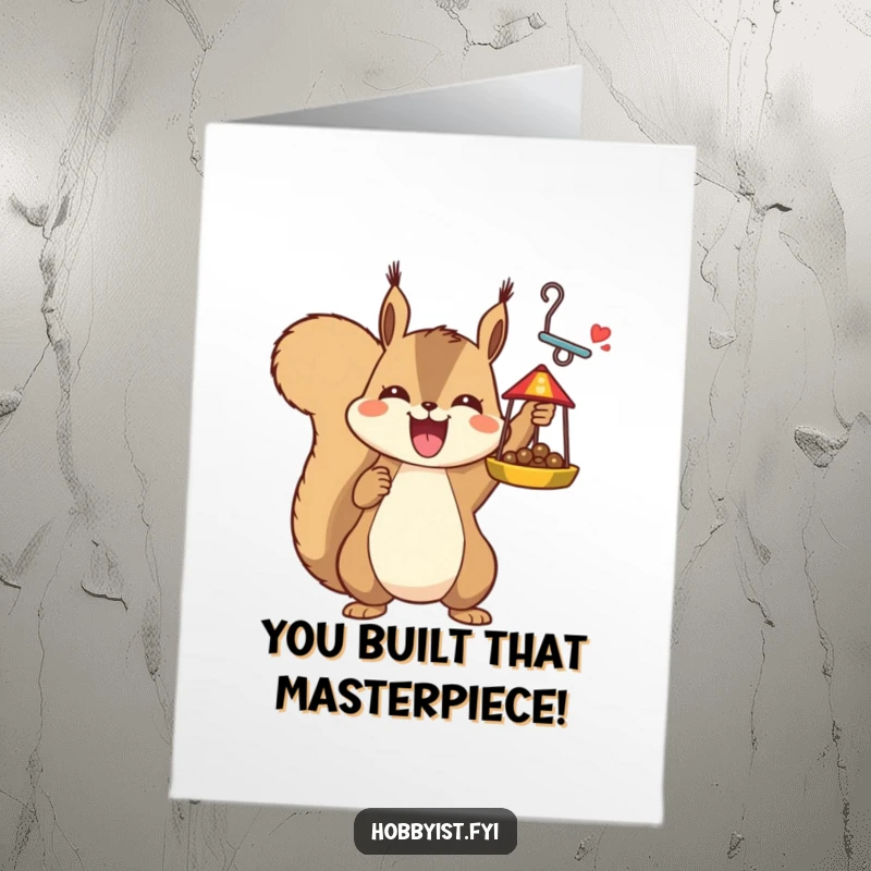 Funny free printable congratulations card featuring a joyful squirrel character triumphantly displaying a meticulously crafted, intricate bird feeder.