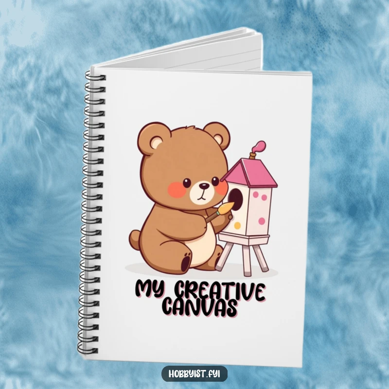 Funny cute bear painting a birdhouse with a small brush, on a notebook cover, ideal for humorous journaling and gifting.