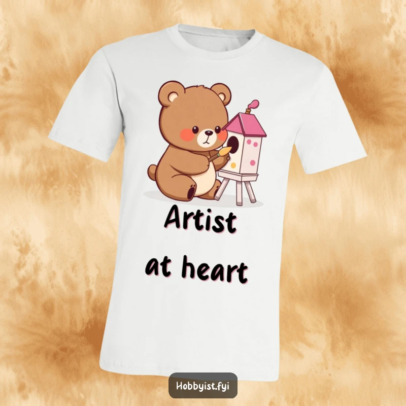 Funny cute bear happily painting a vibrant birdhouse with a small brush, on a t-shirt, a humorous and artistic gift.