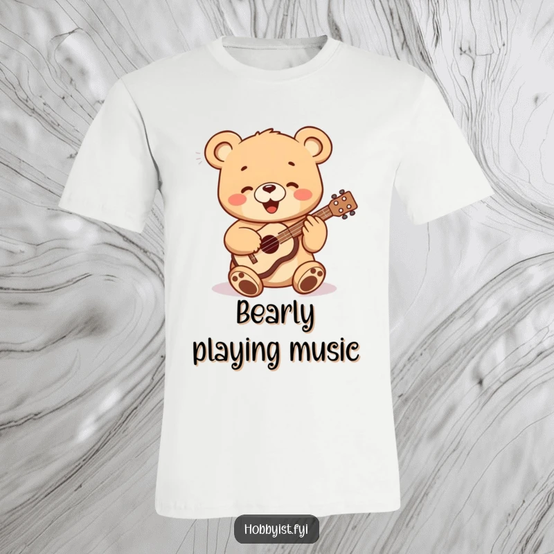 Funny bear cub enthusiastically playing a small ukulele, printed on a soft graphic t-shirt, ideal for a fun gift.