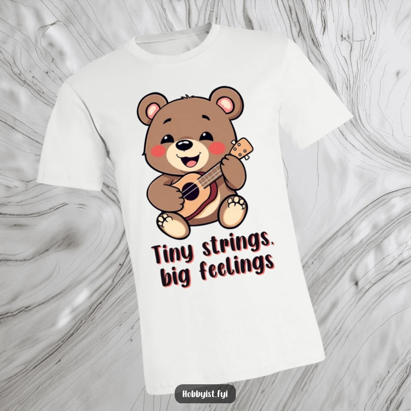 Funny Bear T-Shirt: A smiling bear enthusiastically plays a miniature ukulele, radiating joy and musical passion, a great funny gift.