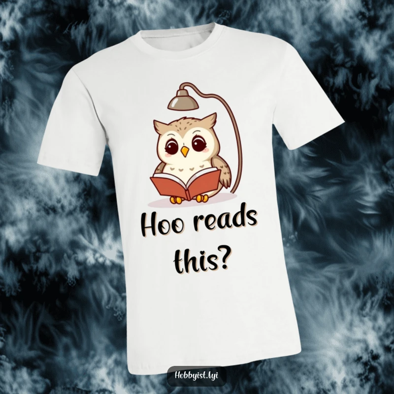 Funny owl with spectacles reading a book under a lamp, printed on a comfortable graphic t-shirt, great for readers.