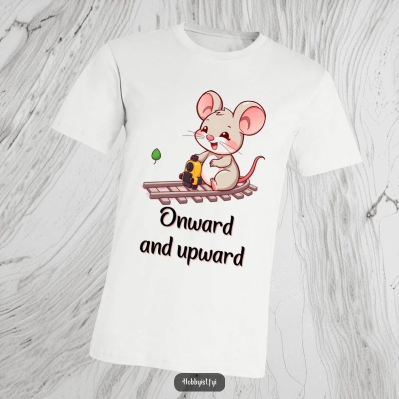 Funny and cheerful mouse character deeply engrossed in playing with miniature train tracks and a small locomotive on this t-shirt.