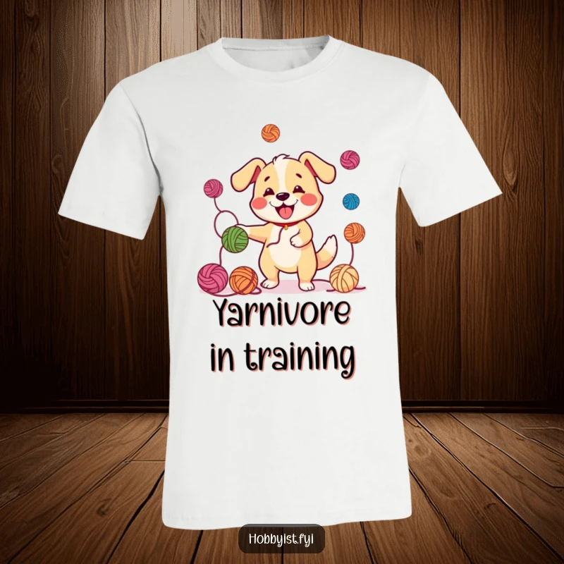 Funny Juggling Dog Yarn T-Shirt: A happy dog juggling yarn balls with a wagging tail, depicted on a comfortable and funny t-shirt.