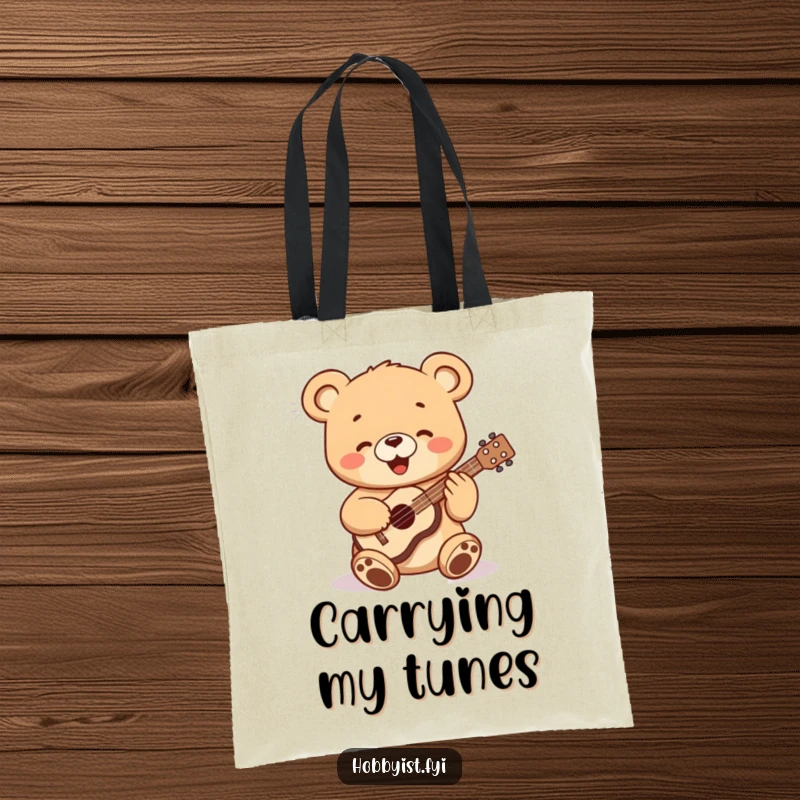 Funny bear cub playing a miniature ukulele, printed on a durable tote bag, a charming and practical gift.
