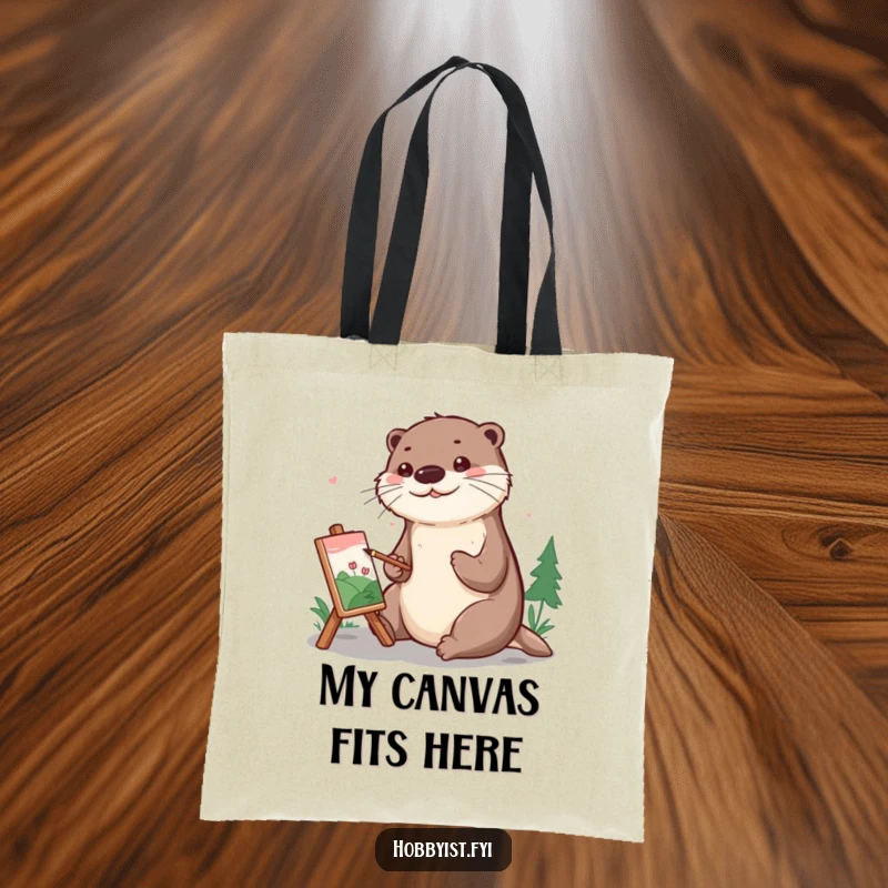 Funny Tote Bag depicting a cheerful otter meticulously painting a tiny landscape, a portable piece of art inspiration.