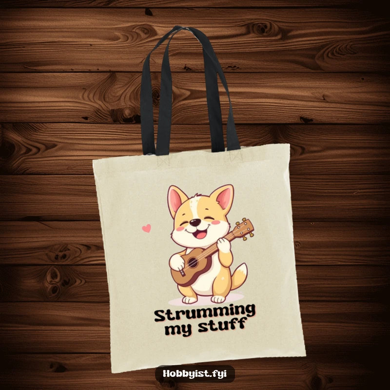 Funny tote bag with a giggling dog joyfully strumming a tiny ukulele, perfect for carrying items with musical humor.